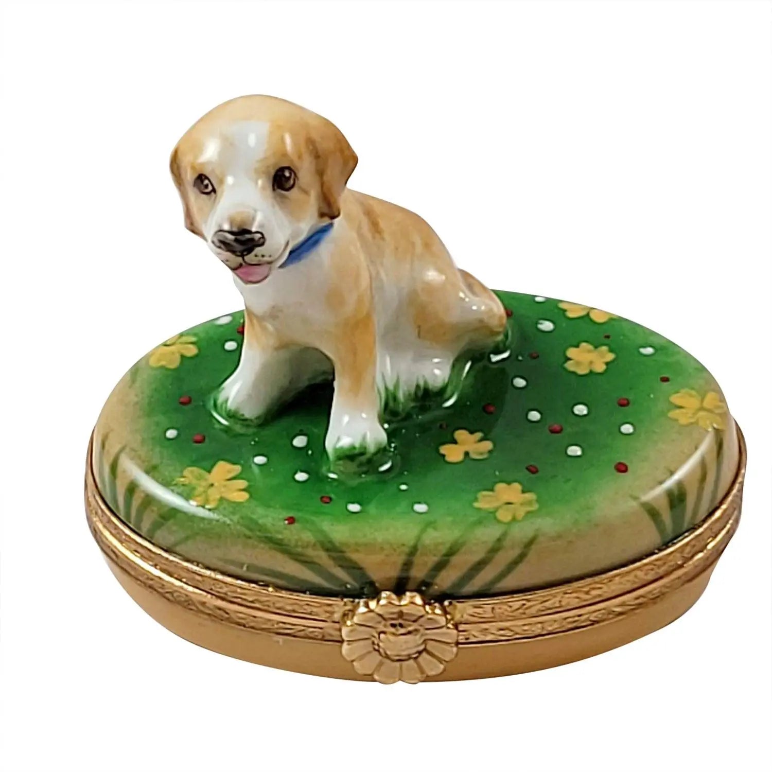 Limoges porcelain functional art keepsake box featuring a detailed puppy figurine on a floral green base