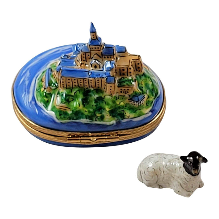 Porcelain Limoges figurines featuring a detailed castle and a small sheep representing types of Limoges figurines