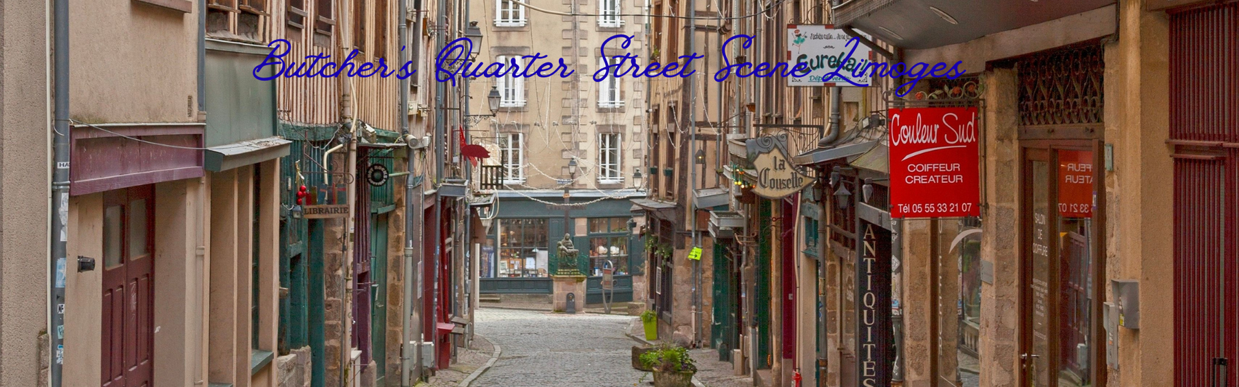 Street view of Butchers Quarter with old buildings and shops showcasing what is Limoges famous for