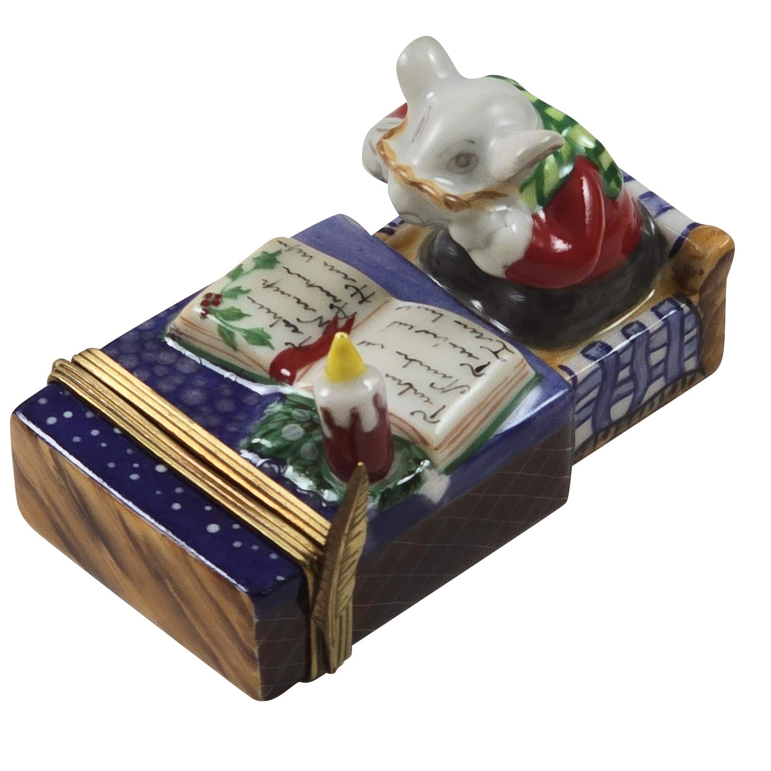 Decorative ceramic figurine of a mouse reading a book on a bed showcasing 2025 luxury miniature keepsake trends