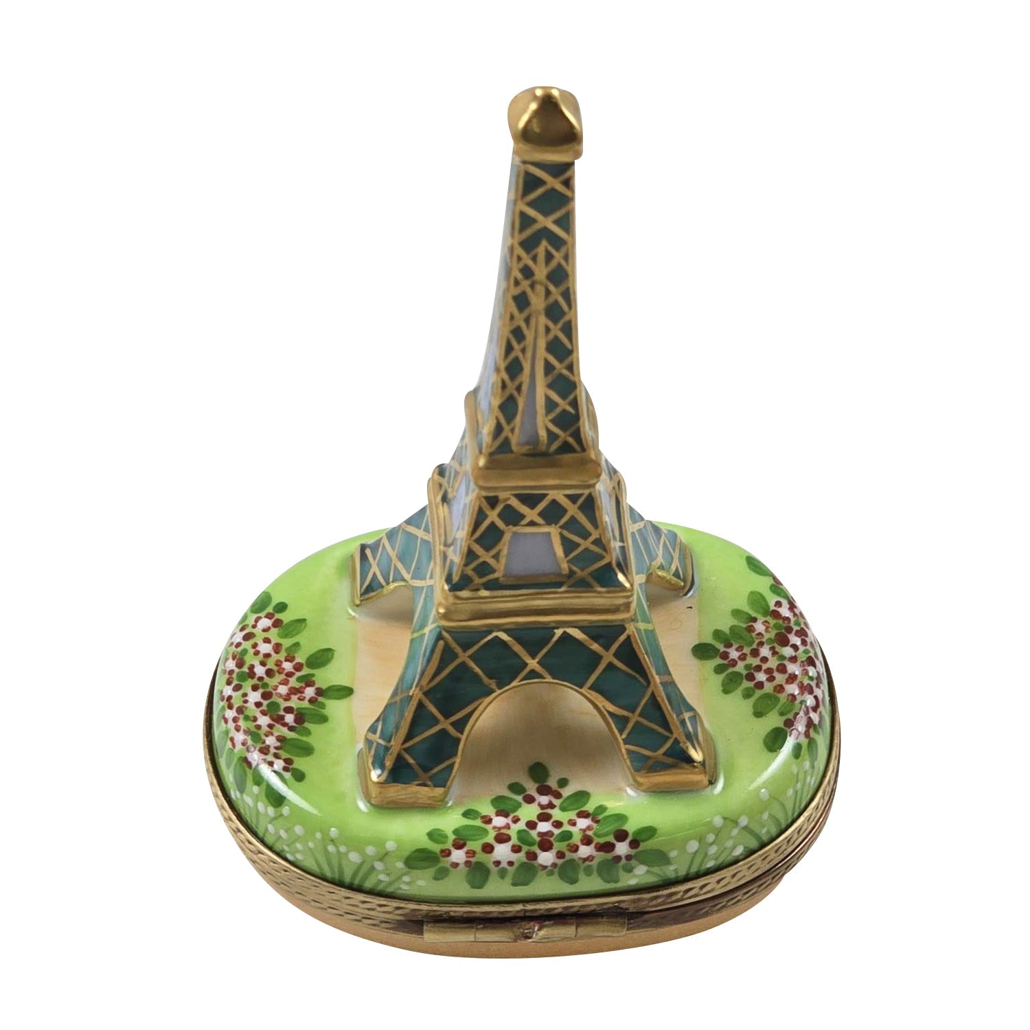 Decorative Limoges box shaped like the Eiffel Tower with floral designs highlighting the history of the French Limoges boxes