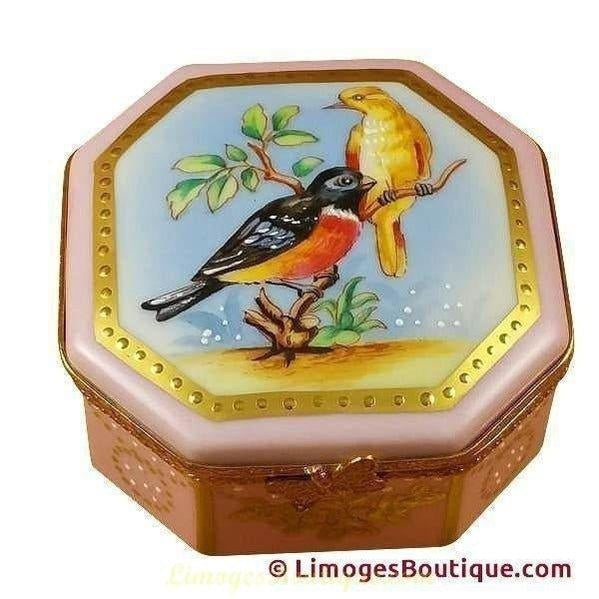 Luxury Limoges porcelain boxes with hand-painted birds and gold detailing on octagonal shape