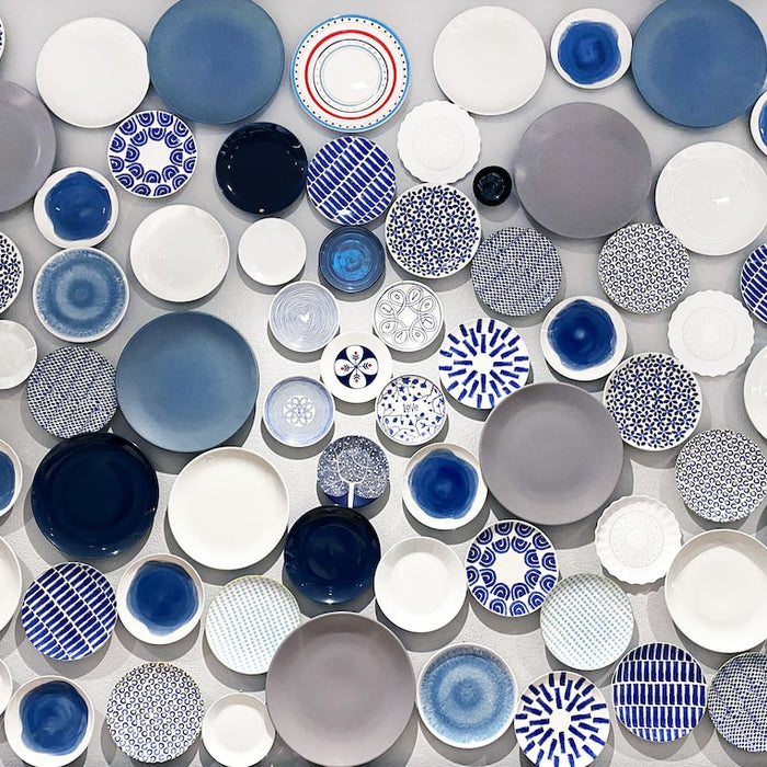 Collection of luxury hand-painted porcelain plates in various blue and white intricate designs