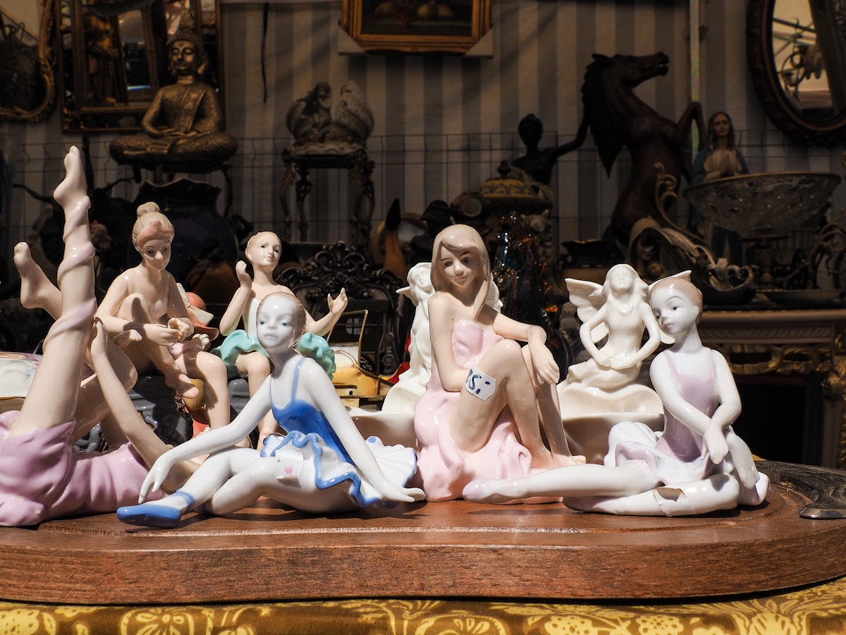 a group of figurines sitting on top of a table
