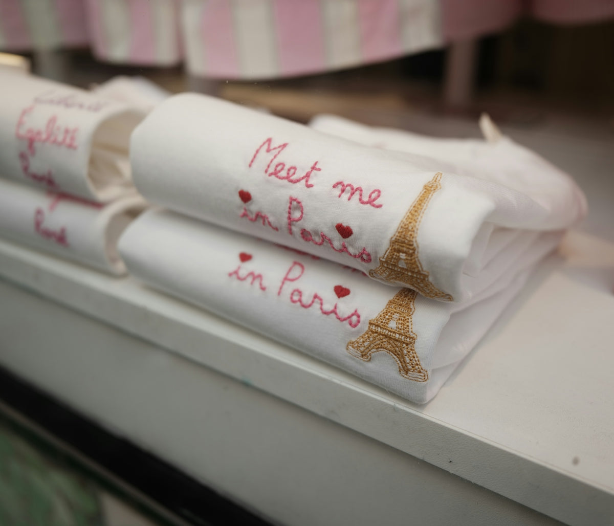 White towels embroidered with eiffel tower and paris text