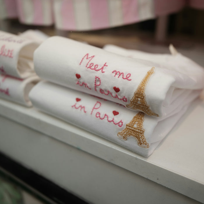 White towels embroidered with eiffel tower and paris text