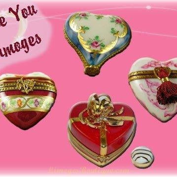 Collection of heart-shaped Limoges boxes showcasing intricate designs and fine French porcelain craftsmanship