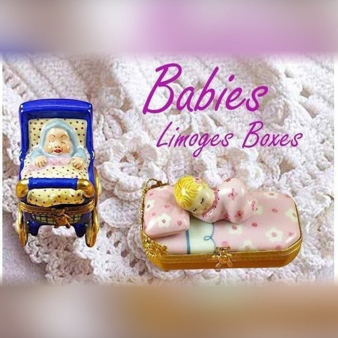 Two baby Limoges box porcelain figurines featuring a sleeping baby on a bed and a baby in a stroller