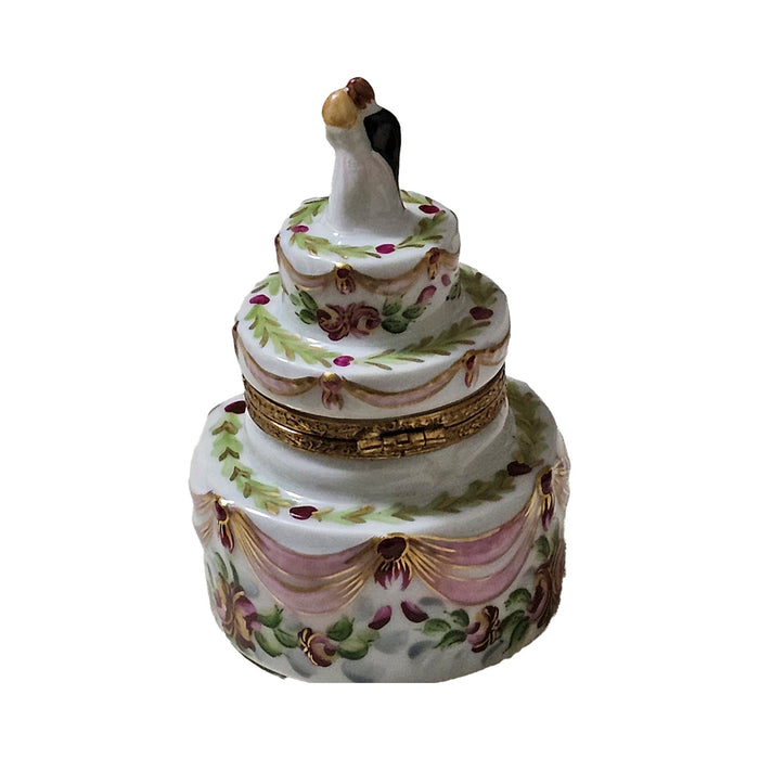 The Wedding Cake with Bride and Groom Pink Ribbons, a Limoges keepsake with true French charm