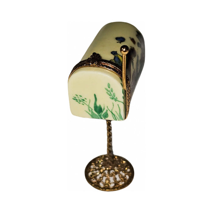 Fine French craftsmanship on the Yellow Mail Limoges box, painted by hand