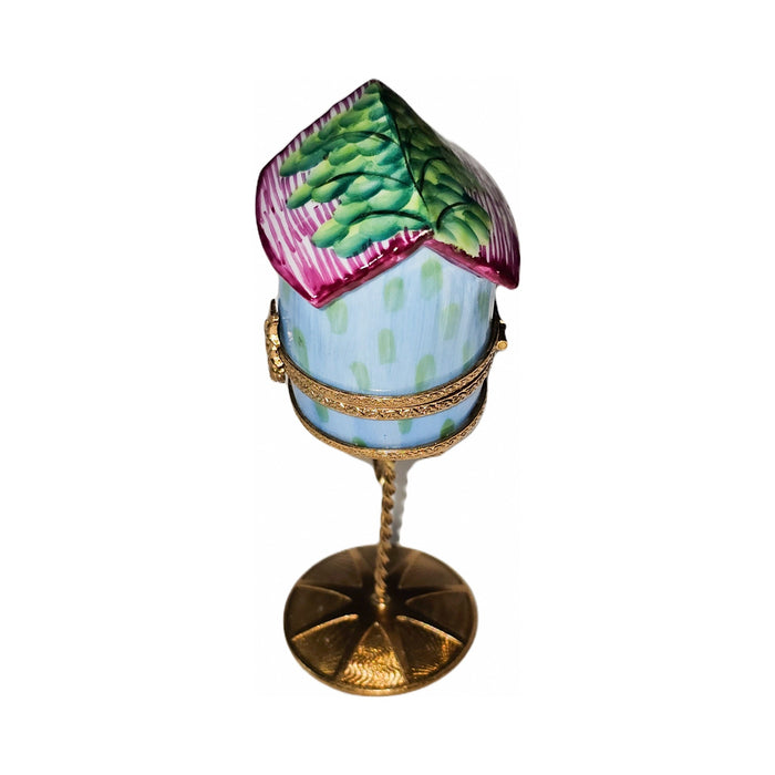 Fine French craftsmanship on the Whimsical Bird House in Stand Limoges box, painted by hand