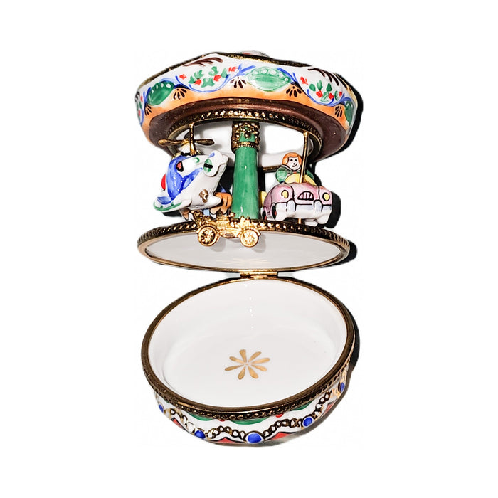 Fine French craftsmanship on the White Carousel Bumper Cars Merry Go Round Limoges box, painted by hand