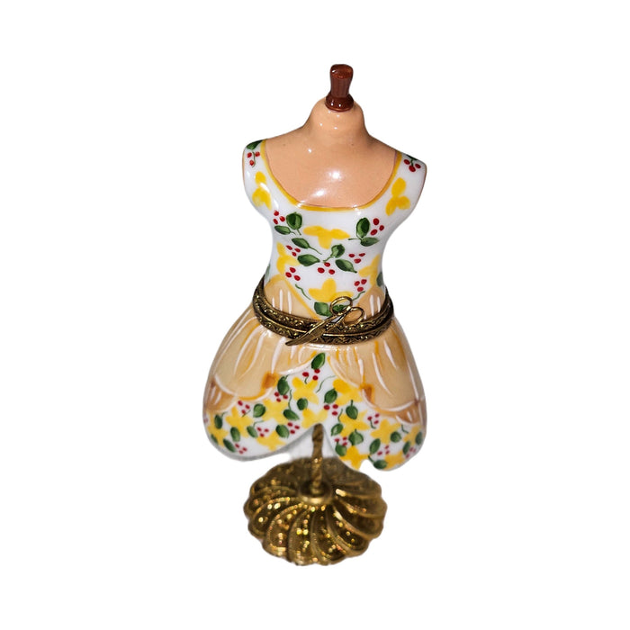 Limoges Boutique presents the Yellow Dress on Mannequin Form, a genuine Limoges box painted by hand in France