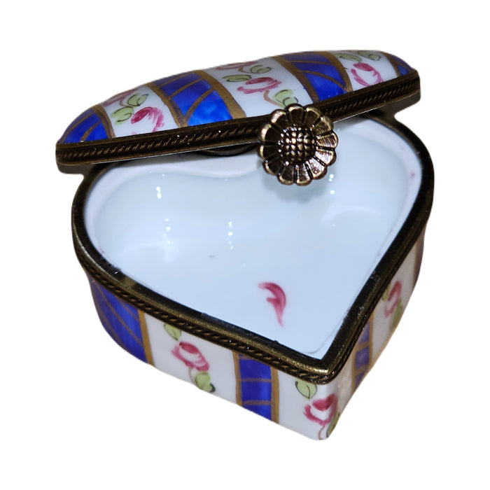Every brushstroke by hand on the Blue Stripes Hearts with Roses Heart Limoges box from France
