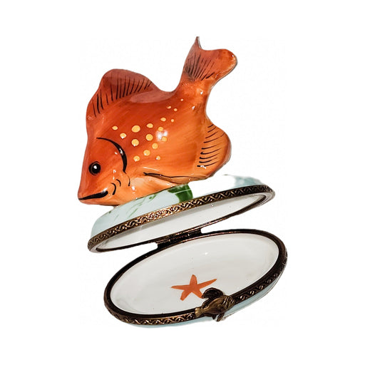 Every brushstroke by hand on the Vibrant Orange Fish Limoges box from France
