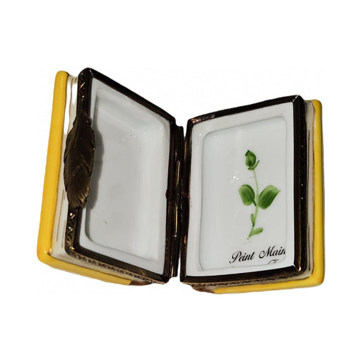 Painted details on the Yellow Book with Flowers Limoges box, French art in miniature