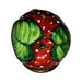 Top view of the green leaves crowning the hand-painted strawberry Limoges box