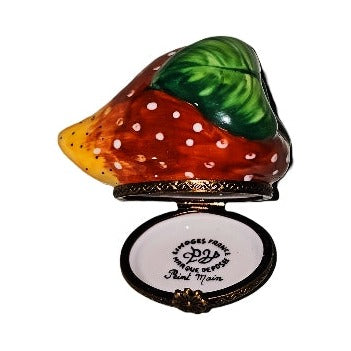 Painted details on the Large Strawberry Limoges box, French art in miniature