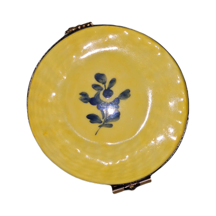 Every brushstroke by hand on the Yellow Bonnet Hat Blue Limoges box from France