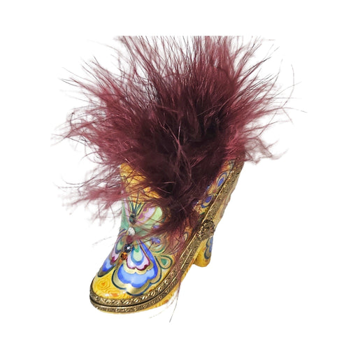 Limoges Boutique presents the Yellow Shoe with Butterfly Red Feathers, a genuine Limoges box painted by hand in France