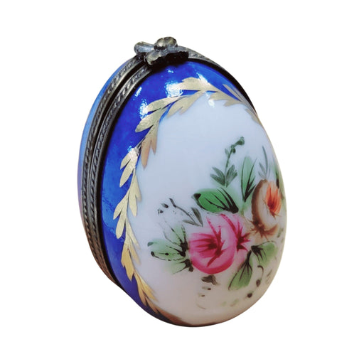 Limoges Boutique presents the Blue Egg Vertical Perfume, a genuine Limoges box painted by hand in France