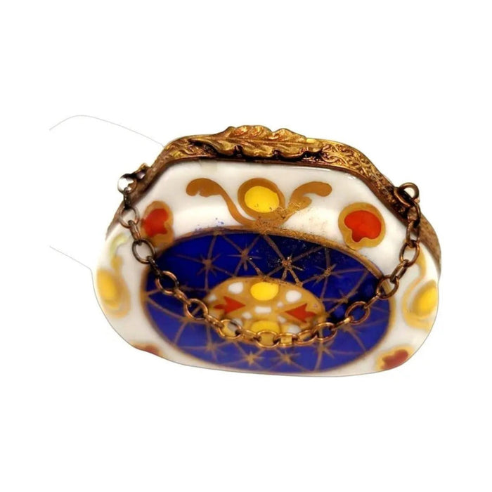 Limoges Boutique presents the Blue Purse with Yellow & Red Dots, a genuine Limoges box painted by hand in France