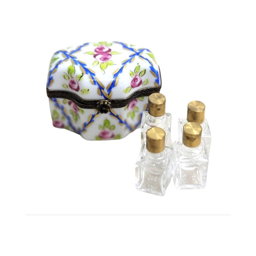 Limoges Boutique presents the 4 Perfume Roses Blue, a genuine Limoges box painted by hand in France
