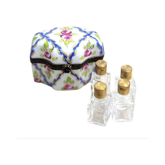 Limoges Boutique presents the 4 Perfume Roses Blue, a genuine Limoges box painted by hand in France