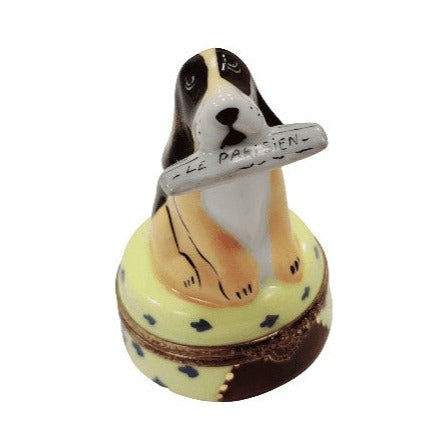Limoges Boutique presents the Dog with Newspaper, a genuine Limoges box painted by hand in France