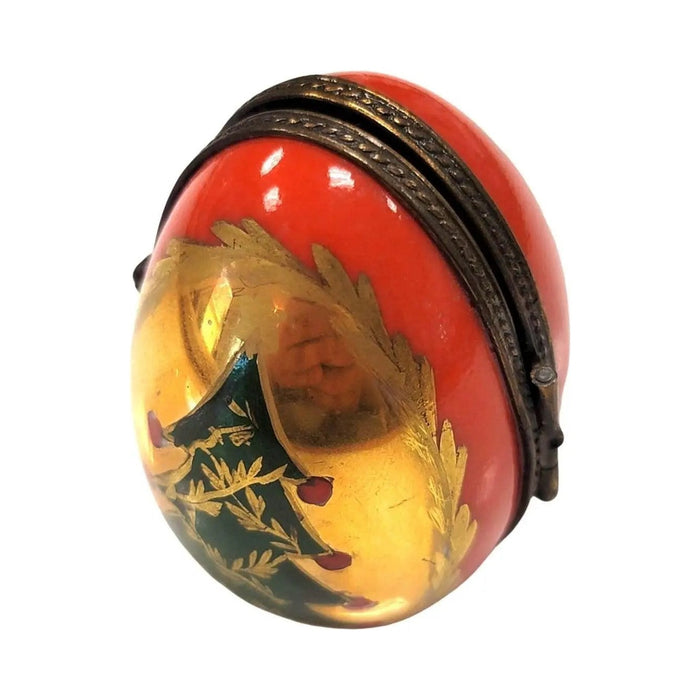 Fine French craftsmanship on the Christmas Tree Egg Picture Frame Limoges box, painted by hand