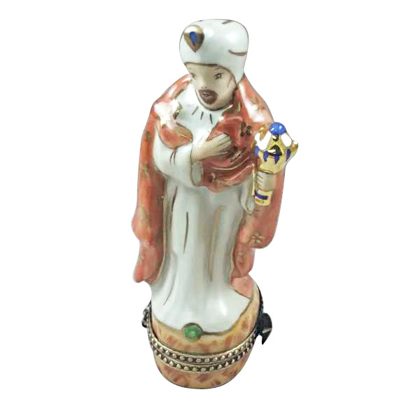 Wise king in a white robe and peach cloak offering a gold gift, from the Rochard satin nativity