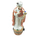Wise king in a white robe and peach cloak offering a gold gift, from the Rochard satin nativity