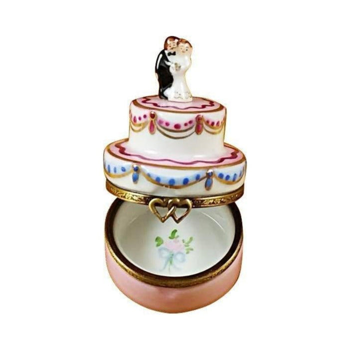 Fine French craftsmanship on the Mini Wedding Cake with Bride and Groom Limoges box, painted by hand
