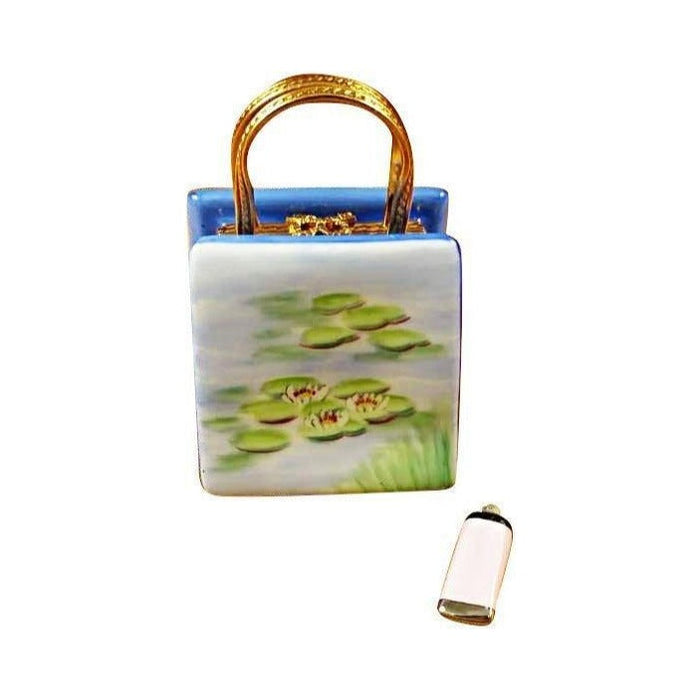 The painter's artistry shows on this Monet Bag with Bridge & Water Lily Limoges box