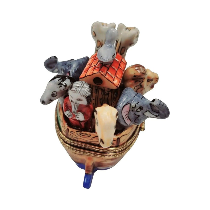 Noah peeking out among the animals with the red-roofed cabin and dove on top of the ark