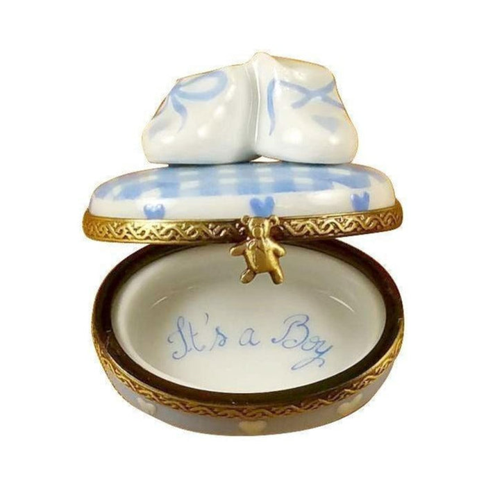 Painted details on the Oval It's a Boy with Shoes Limoges box, French art in miniature