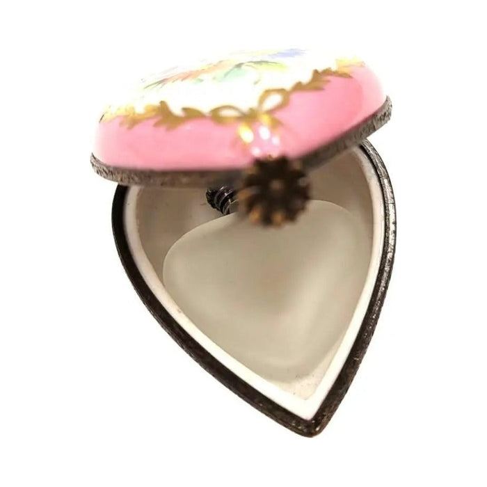 Fine French craftsmanship on the Pink Heart Perfume Bottle Inside Limoges box, painted by hand