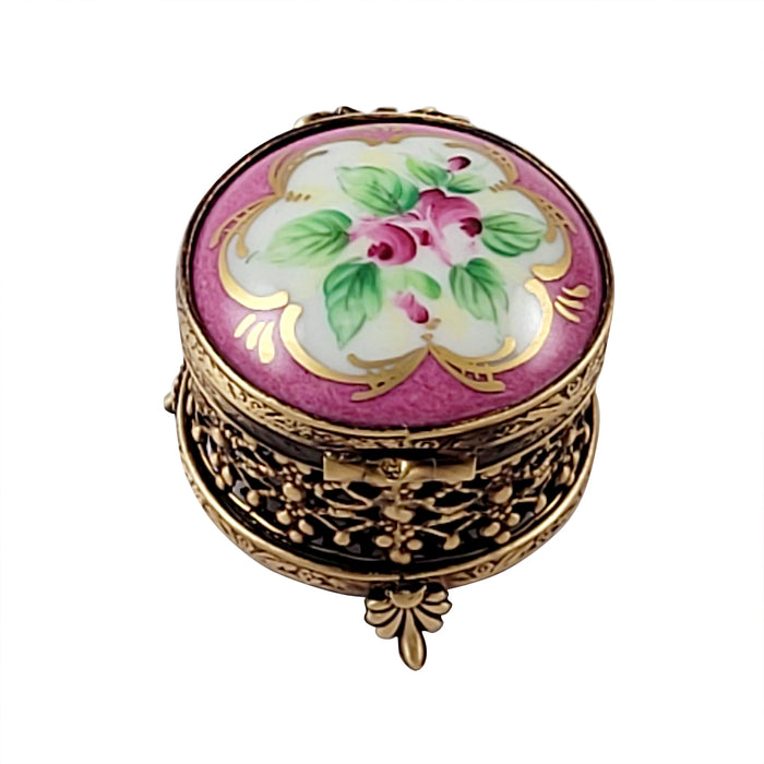 SMALL ROUND PINK WITH FLOWERS AND ORNATE BRASS