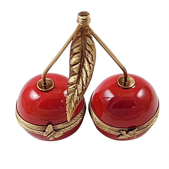 TWO CHERRIES WITH BRASS STEMS