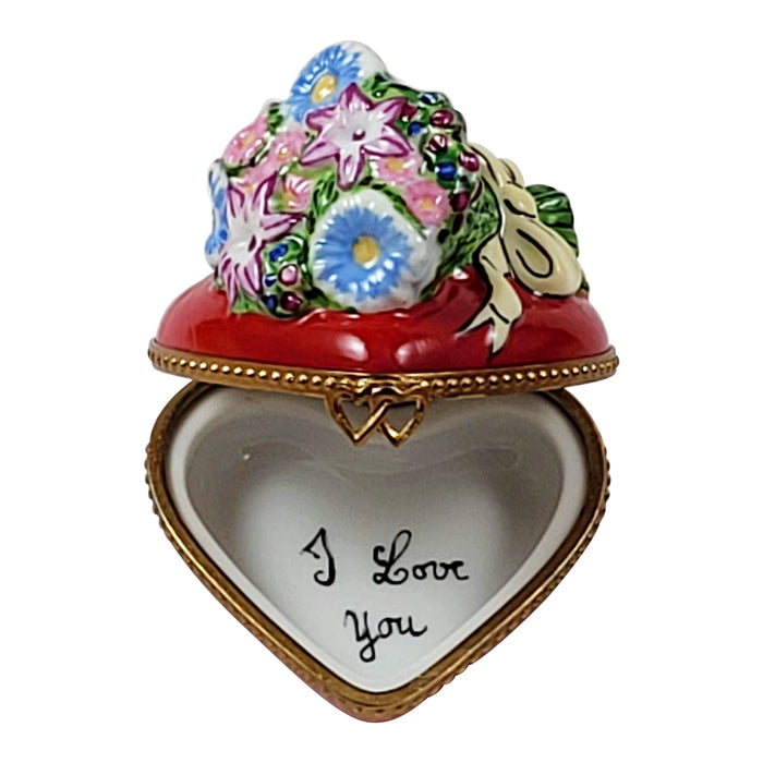 Heart with bouquet of flowers on top