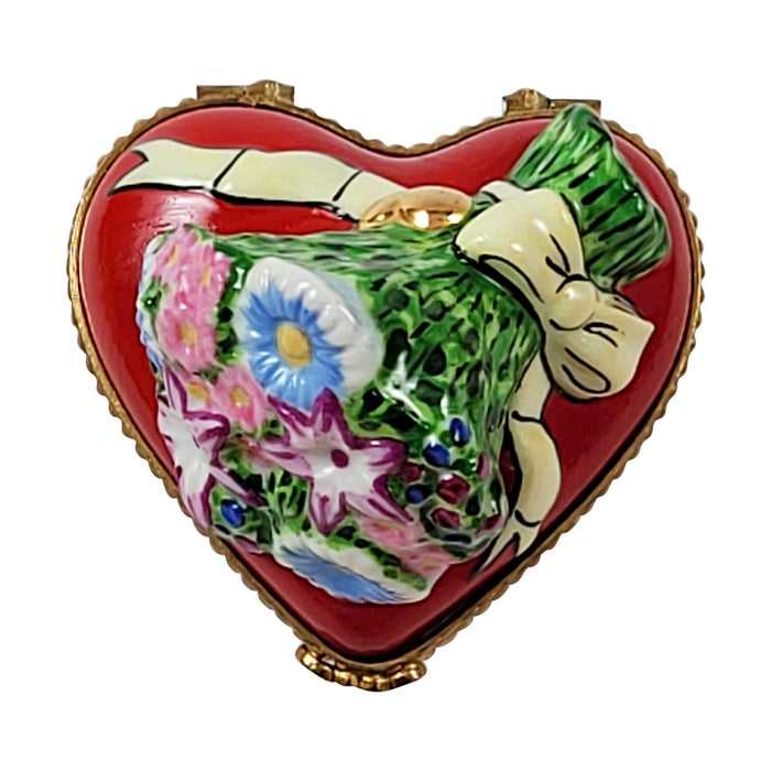 Heart with bouquet of flowers on top