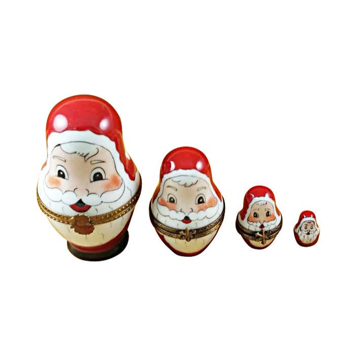 Limoges Boutique presents the Rochard Four Nesting Santa, a genuine Limoges box painted by hand in France