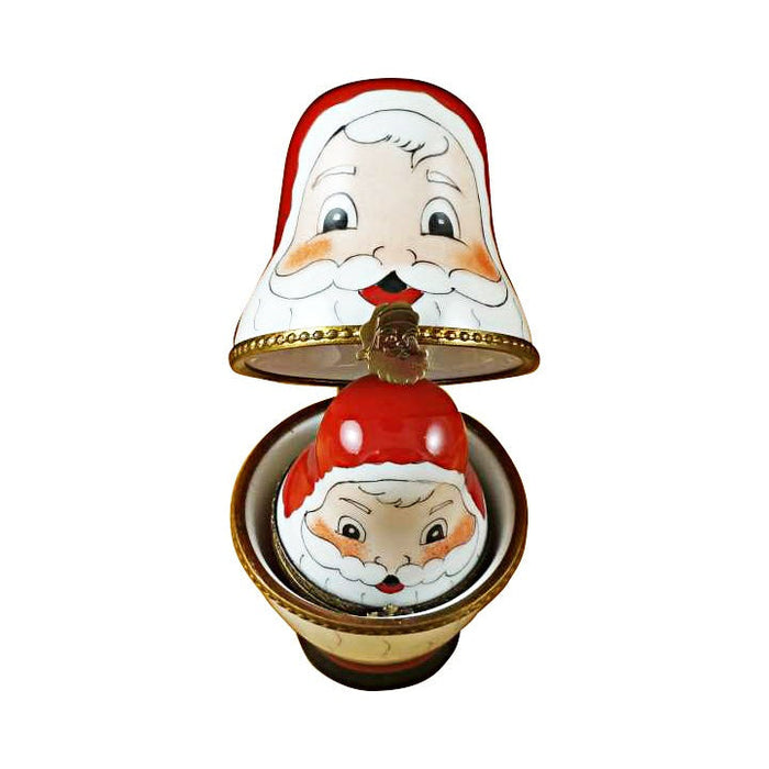 Every brushstroke by hand on the Four Nesting Santa Limoges box from France