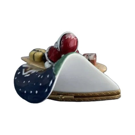 Fine art lovers will admire this Santa on a Surfboard Limoges box