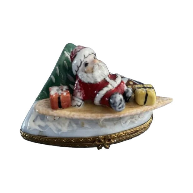 Genuine Rochard Santa on a Surfboard Limoges box painted by hand in France for Christmas, from Limoges Boutique