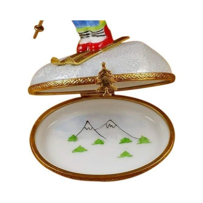 Artisan-painted Skier on Mountain USA Limoges box from France, a cherished collectible