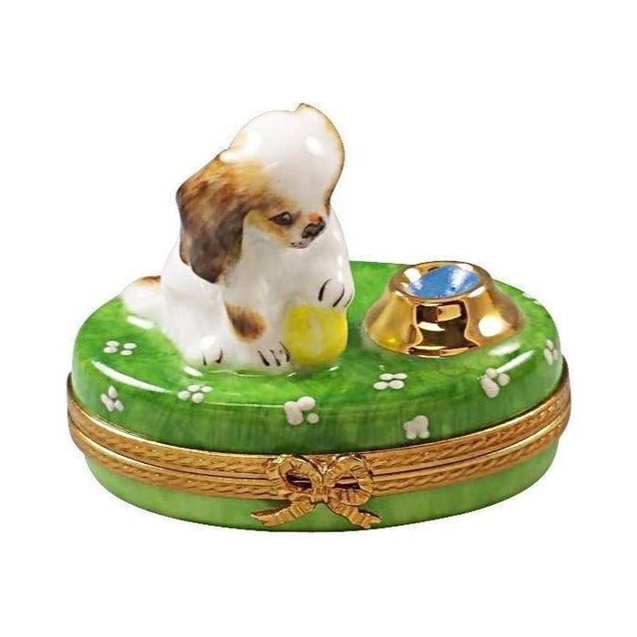 Authentic Rochard Spaniel Puppy with Ball and Bowl Limoges box, hand-painted in France, from Limoges Boutique