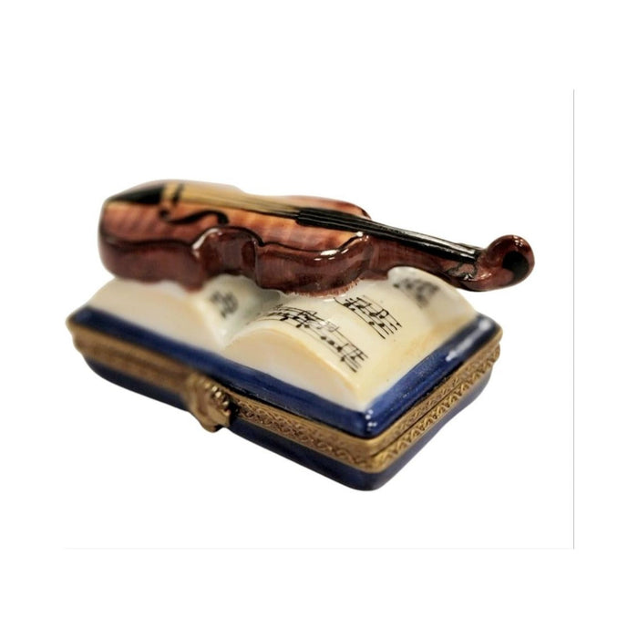 Limoges Boutique presents the Violin on Book, a genuine Limoges box painted by hand in France
