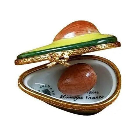 Painted details on the Avocado Half Removable Pit Limoges box, French art in miniature
