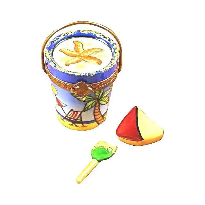 Authentic Rochard Beach Pail with Sailboat & Shovel Limoges box, hand-painted in France, from Limoges Boutique
